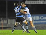 2 October 2009; Paul Neville, Garryowen, is tackled by Tadgh Bennett, Shannon. AIB League, Division 1A, Garryowen v Shannon, Dooradoyle, Limerick. Picture credit: Diarmuid Greene / SPORTSFILE