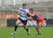 3 October 2009; David Moore, Blackrock College, is tackled by Tommy O'Donnell, UL Bohemian. AIB League, Division 1A, UL Bohemian v Blackrock College, Thomond Park, Limerick. Picture credit: Diarmuid Greene / SPORTSFILE