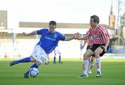 3 October 2009; Michael Carvill, Linfield, in action against Gerard O'Brien, Derry City. Setanta Sports Cup, Linfield v Derry City, Windsor Park, Belfast. Co. Antrim. Photo by Sportsfile