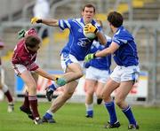 4 October 2009; Cathal Collins, Cavan Gaels, in action against Hubert Smith, Denn. Cavan County Senior Football Final, Cavan Gaels v Denn, Kingspan Breffni Park, Cavan. Picture credit: Brian Lawless / SPORTSFILE