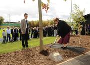 4 October 2009; Dr. Majorie Fitzpatrick, sister of the late Dr. Tony O'Neill, with John Coman, UCD Corporate & Legal Affairs Secretary, during a tree planting on the occasion of the anniversary of the passing of the late Dr. Tony O'Neill. UCD Bowl, UCD, Dublin. Picture credit: Stephen McCarthy / SPORTSFILE