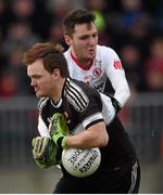 10 January 2016; Thomas Mallon, Derry, in action against Patrick Quinn, Tyrone. Bank of Ireland Dr. McKenna Cup, Group A, Round 2, Derry v Tyrone. Derry GAA Centre of Excellence, Owenbeg, Derry. Picture credit: Stephen McCarthy / SPORTSFILE