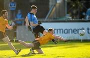 10 January 2016; Con O'Callaghan, Dublin, shoots to score his side's first goal despite the efforts of Dessie Ward, DCU. Bord na Mona O'Byrne Cup, Section A, Dublin v DCU, Parnell Park, Dublin. Photo by Sportsfile