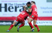 10 January 2016; Bundee Aki, Connacht, is tackled by Hadleigh Parkes and Aled Thomas, Scarlets. Guinness PRO12, Round 12, Scarlets v Connacht, Parc Y Scarlets, Llanelli, Wales. Picture credit: Ben Evans / SPORTSFILE