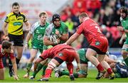 10 January 2016; John Muldoon, Connacht, is tackled by Tom Price and Samson Lee, Scarlets. Guinness PRO12, Round 12, Scarlets v Connacht, Parc Y Scarlets, Llanelli, Wales. Picture credit: Ben Evans / SPORTSFILE