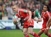 10 October 2009; Paul Warwick, Munster, is tackled by Jon Clarke, Northampton Saints. Heineken Cup Pool 1 Round 1, Northampton Saints v Munster, Franklin's Gardens, Northampton, England. Picture credit: Matt Browne / SPORTSFILE