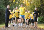 7 October 2009; Metropolitan Harriers & St Brigid’s Athletic Club is delighted to announce that Hibernian Aviva Health will be this year’s sponsor of the 25th Anniversary Gerry Farnan Cross Country Festival, to be held adjacent to the Magazine Fort in the Phoenix Park on Sunday 18th October, 2009. The Cross Country Festival will have a series of mixed races for boys and girls from 8 to 12 years old, 13 to 16 years old, the Dublin under 18 Championships for boys and girls. The feature races will be the Gerry Farnan Men’s race over 5 miles and Women’s race over 3 miles, while the Masters events will act as trials for the teams competing in the forthcoming International Cross Country. Ireland’s leading senior and junior runners are expected to compete. The AAI International selectors will use the races to monitor the progress of our potential team candidates for the European Cross Country Championships to be held in Dublin in December. Pictured at the announcement are Club President and Race Director Eamonn Coghlan and Vanessa Hartley, Marketing Director, Hibernian Aviva Health and the Hibernian Aviva running team. Dublin. Picture credit: Brendan Moran / SPORTSFILE