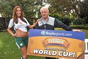 7 October 2009; Republic of Ireland manager Giovanni Trapattoni was pictured with stunning Louise Kavanagh to help Boylesports, the official bookmaker of the Irish soccer team, launch their Golden Ticket World Cup Competition where one lucky customer will win a trip for two to the World Cup in South Africa. Boylesports will also be supporting Irish fans on Saturday evening ahead of the World Cup qualifier by giving out free pizza in a number of pubs around Croke Park. For more information on the Boylesports’ Golden Ticket World Cup Competition please log on to www.boylesports.com. Portmarnock Hotel and Golf Links, Portmarnock, Dublin. Picture credit: David Maher / SPORTSFILE