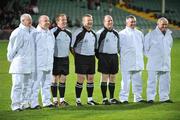 10 October 2009; Referee Michael O'Connor, centre, with his match officials, Michael Meade and Donie Browne (linesmen), and umpires Neilly Browne, Derek Byrne, John Phillips and John Hurley before the game. Limerick County Senior Football Final, Dromcollogher Broadford v Fr.Casey's, Gaelic Grounds, Limerick. Picture credit: Diarmuid Greene / SPORTSFILE