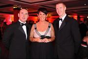 16 October 2009; Carolan Lennon, Consumer Marketing Director, Vodafone, with Tipperay hurler Eoin Kelly and  Kilkenny hurler Henry Shefflin during the 2009 GAA All-Stars Awards, sponsored by Vodafone. Citywest Hotel, Conference, Leisure & Golf Resort, Dublin. Picture credit: Ray McManus / SPORTSFILE