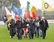 18 October 2009; Leading the 125 year celebrations parade prior to the game are, from left, Tony Fawl, Mickey Harte, Peter Canavan, Brian Dooher and Cuthbert Donnelly. Tyrone County Senior Football Final. Dromore v Ardboe, Healy Park, Omagh, Co. Tyrone. Picture credit: Michael Cullen / SPORTSFILE