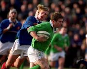 16 February 2001; Gordon D'Arcy of Ireland is tackled by Cedric Savignat of France during the U21 Rugby International match between Ireland and France at Templeville Road in Dublin. Photo by Matt Browne/Sportsfile
