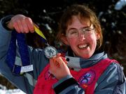 8 March 2001; Lorraine Whelan, form Delgany, Wicklow, proudly shows her silver medal won in the Novice Downhill Skiing Final during the 2001 Special Olympics World Winter Games at the Alyeska Ski Resort in Anchorage, Alaska, USA. Photo by Ray McManus/Sportsfile