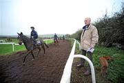 2 November 2009; Champion Trainer Willie Mullins with his dog Lara on the gallops during a stable visit. Willie Mullins Stables, Closutton, Bagnelstown, Co. Carlow. Picture credit: Matt Browne / SPORTSFILE