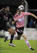 6 November 2009; Clive Delaney, Derry City, in action against Darren Mansaram, Dundalk. League of Ireland Premier Division, Dundalk v Derry City, Oriel Park, Dundalk, Co. Louth. Photo by Sportsfile