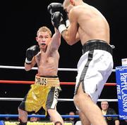 6 November 2009; Carl Framton in action against Ignac Kassai, during their super bantamweight contest on the undercard. European Light Welterweight Title Fight, Paul McCloskey v Daniel Rasilla, Meabowbank Sports Arena, Magherafelt, Co. Derry. Picture credit: Oliver McVeigh / SPORTSFILE