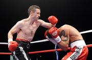 6 November 2009; Paul McCloskey, left, in action against Daniel Rasilla during the 1st round of their European Light Welterweight Title bout. European Light Welterweight Title Fight, Paul McCloskey v Daniel Rasilla, Meabowbank Sports Arena, Magherafelt, Co. Derry. Picture credit: Oliver McVeigh / SPORTSFILE