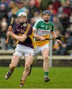 24 January 2016; David Dunne, Wexford, in action against Chris McDonald, Offaly. Bord na Mona Walsh Cup, Semi-Final, Wexford v Offaly, Kennedy Park, New Ross, Co. Wexford. Picture credit: Sam Barnes / SPORTSFILE