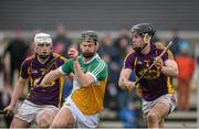 24 January 2016; Sean Cleary, Offaly, in action against Andrew Kenny. Bord na Mona Walsh Cup, Semi-Final, Wexford v Offaly, Kennedy Park, New Ross, Co. Wexford. Picture credit: Sam Barnes / SPORTSFILE