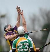 24 January 2016; Shane Tompkins, Wexford, in action against Pat Kenney, Offaly. Bord na Mona Walsh Cup, Semi-Final, Wexford v Offaly, Kennedy Park, New Ross, Co. Wexford. Picture credit: Sam Barnes / SPORTSFILE