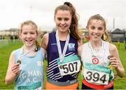 24 January 2016; Winner of the Girl's under 13 1500m race Ava O'Connor, centre, Emo/Rath AC, Co. Laois, with second placed Saoirse Crowe, left, St. Marys AC, Co Clare and third placed Orla Reidy, right,  St. Coca's AC, Co Kildare. The GloHealth National Master, Intermediate, Juvenile B & Juvenile Inter County Relay. Dundalk IT, Dundalk, Co. Louth. Picture credit: Tomás Greally / SPORTSFILE