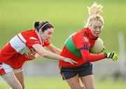 8 November 2009; Martina Dunne, Timahoe, in action against Fiona Courtney, Donaghmoyne. All-Ireland Ladies Senior Club Football Championship Semi-Final, Donaghmoyne, Monaghan, v Timahoe, Laois, Donaghmoyne, Co. Monaghan. Photo by Sportsfile