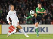 14 November 2009; Warren Feeney, Northern Ireland, in action against Nemanja Vidic, Serbia. Friendly International, Northern Ireland v Serbia, Windsor Park, Belfast. Picture credit: Oliver McVeigh / SPORTSFILE