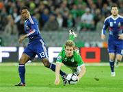 14 November 2009; Kevin Doyle, Republic of Ireland, in action against Patrice Evra, France. FIFA 2010 World Cup Qualifying Play-off 1st Leg, Republic of Ireland v France, Croke Park, Dublin. Photo by Sportsfile