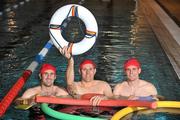 11 November 2009; Former Dublin footballer Ciarán Whelan with Dublin stars Bryan Cullen, left, and Stephen Cluxton who participated in St Michael’s House Santa Swim 2009 at DCU. The Santa Swim aims to virtually float Santa Claus’ sleigh from the North Pole to Ireland in time for Christmas - this will involve an exhausting 80,000 lengths in a 25 metre pool! St Michael’s House, Ireland’s largest provider of community-based services for people with an intellectual disability has teamed up with Dublin City Council to encourage people to swim as many lengths as possible.The Santa Swim officially commenced on Monday, 9th November and will end on Sunday, 15th November at a number of pools around Dublin city and county. The Santa Swim will raise vital funds for new and innovative educational and sporting equipment. The initiative is also supported by Dublin radio station Q102, a charity partner of St Michael’s House. You can register for the event now by emailing fundraising@smh.ie or calling Dublin (01) 299 0500. Further information on Santa Swim 2009 as well as a full list of pools and events is available at www.smh.ie. Dublin City University, Glasnevin, Dublin. Picture credit: Brian Lawless / SPORTSFILE