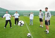 12 November 2009; Footballers from the Special Olympics Sporting Fingal club, left to right, Brendan O'Reilly, Thomas Leonard and Ian Brady, with Republic of Ireland players Eddie Nolan and Darren O'Dea during a training session at Gannon Park. The Football Association of Ireland have announced that the Republic of Ireland have become the first national side to take on the role of Global Team Ambassadors for the Special Olympics Global Football Initiative, using the power of football to promote respect, acceptance and inclusion for people with intellectual disabilities. Gannon Park, Malahide, Co. Dublin. Picture credit: David Maher / SPORTSFILE