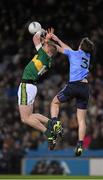 30 January 2016; Michael Fitzsimons, Dublin, punches the ball clear of Kerry's Tommy Walsh during the fdirst half. Allianz Football League, Division 1, Round 1, Dublin v Kerry, Croke Park, Dublin. Picture credit: Ray McManus / SPORTSFILE