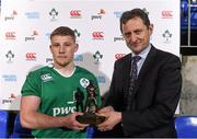 5 February 2016; Pictured is Jim Dollard, Executive Director from Electric Ireland, proud sponsor of the U20’s Six Nations Home Games, presenting John Pollard with the Player of the Match award for his outstanding performance in the Electric Ireland U20s Six Nations Home Game, Ireland v Wales in Donnybrook Stadium. Electric Ireland believes in Smarter Living and for rugby fans these matches are the smarter choice to experience the Six Nations atmosphere while seeing at first hand the future stars of Irish rugby.  Photo by Sportsfile