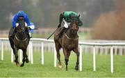 6 February 2016; Footpad, with Danny Mullins up, on their way to winning the GAIN Spring Juvenile Hurdle from second place Allblak Des Places with Paul Townend. Horse Racing from Leopardstown. Leopardstown, Co. Dublin. Picture credit: Matt Browne / SPORTSFILE