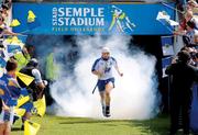 12 July 2009; Not men but giants. Munster hurling final day. Stephen Molumphy leads his Waterford team into the light. Picture credit: Brendan Moran / SPORTSFILE   This image may be reproduced free of charge when used in conjunction with a review of the book &quot;A Season of Sundays 2009&quot;. All other usage © SPORTSFILE