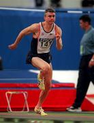 9 March 2001; Jonathan Edwards of Great Britain competing in the Men's Triple Jump event during the World Indoor Athletics Championship at the Atlantic Pavillion in Lisbon, Portugal. Photo by Brendan Moran/Sportsfile