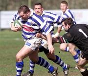 31 March 2001; Gary Leslie of Dungannon is tackled by Eddie Devitt of DLSP during the AIB All-Ireland League Division 1 match between Dungannon RFC and DLSP RFC at Stevenson Park in Dungannon, Tyrone. Photo by Sportsfile