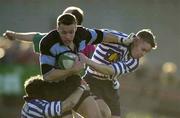 4 April 2001; Andrew Thompson of Shannon is tackled by Andrew O'Neill, right, and Dave Popplewell of Blackrock during the AIB All-Ireland League Rugby Division 1 match between Blackrock RFC and Shannon RFC at Blackrock RFC on Stradbrook Road in Dublin. Photo by Brendan Moran/Sportsfile