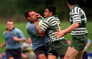 7 April 2001; Salesi Tu'ipulotu of Greystones is tackled by Neil Coughlin of UCD during the AIB All-Ireland League Rugby Division One match between UCD and Greystones at Belfield in Dublin. Photo by Ray Lohan/Sportsfile