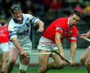 8 April 2001; Alan Browne of Cork in action against Sean Cullinane of Waterford during the Allianz GAA National Hurling League Division 1B Round 4 match between Cork and Waterford at Páirc Uí Chaoimh in Cork. Photo by David Maher/Sportsfile