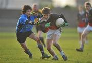 11 December 2009; Cian Reynolds, Ardsc Na Troinoide Athy, in action against James McPadden, St Joseph’s Rochfortbridge. Leinster College Senior Football A Round 1, Ardsc Na Troinoide Athy v St Joseph’s Rochfortbridge, Athy, Co. Kildare. Picture credit: David Maher / SPORTSFILE