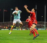 11 December 2009; Jerome Porical, Perpignan, in action against Doug Howlett, Munster. Heineken Cup Pool 1 Round 3, Munster v Perpignan, Thomond Park, Limerick. Picture credit: Stephen McCarthy / SPORTSFILE