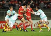 11 December 2009; Doug Howlett, Munster, is tackled by Nicolas Mas, left, and Bertrand Guiry, Perpignan. Heineken Cup Pool 1 Round 3, Munster v Perpignan, Thomond Park, Limerick. Picture credit: Stephen McCarthy / SPORTSFILE