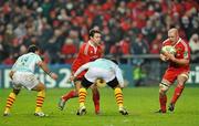 11 December 2009; Munster's Paul O'Connell receives a pass from team-mate David Wallace, in action against Farid Sid, left, Maxime Mermoz, Perpignan. Heineken Cup Pool 1 Round 3, Munster v Perpignan, Thomond Park, Limerick. Picture credit: Diarmuid Greene / SPORTSFILE