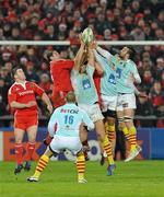 11 December 2009; Alan Quinlan, and David Wallace, Munster, contest a high ball with Yoann Vivalda, Maxime Mermoz, and Bertrand Guiry, Perpignan, as Munster's Damien Varley, left, and Perpignan's Marius Tincu, 16, watch on. Heineken Cup Pool 1 Round 3, Munster v Perpignan, Thomond Park, Limerick. Picture credit: Diarmuid Greene / SPORTSFILE