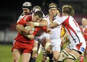 2 January 2010; Damien Varley, Munster, is tackled by Dan Tuohy, Ulster. Celtic League, Ulster v Munster, Ravenhill Park, Belfast. Picture credit: Oliver McVeigh / SPORTSFILE