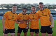 15 February 2016; DCU's, from left, Brian Reape, Shehroz Akram, Michael Plunkett and Matthew Ruane celebrate with the Daithí Billings Cup at the end of the game. Fresher 'A' Football Championship Final. University College Dublin v Dublin City University. Croke Park, Dublin. Picture credit: Piaras Ó Mídheach / SPORTSFILE
