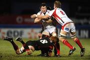 15 January 2010; Ed O'Donoghue, Ulster Rugby, supported by team-mate Chris Henry, 8, is tackled by Roddy Grant, Edinburgh. Heineken Cup Pool 4 Round 5, Ulster Rugby v Edinburgh, Ravenhill Park, Belfast, Antrim. Picture credit: Stephen McCarthy / SPORTSFILE