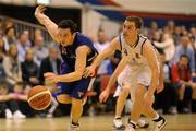 17 January 2010; David Murphy, UCC Demons, in action against Gary Walsh, Neptune. 2010 Basketball Ireland Men's SuperLeague National Cup Semi-Final, UCC Demons v Neptune, Neptune Stadium, Cork. Picture credit: Brendan Moran / SPORTSFILE