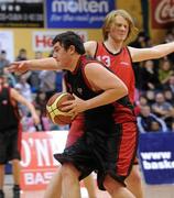 27 January 2010; Michael Foy, St. Eunans, Letterkenny, in action against Feargal Wright, Chanel College, Dublin. All-Ireland School Cup Finals 2010 - U19 Boys B Final, St. Eunans, Letterkenny v Chanel College, Dublin, National Basketball Arena, Tallaght, Dublin. Picture credit: Brian Lawless / SPORTSFILE