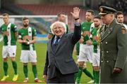 27 February 2016; President of Ireland Michael D. Higgins waves to the crowd after been presented to members of both teams before the start of the game between Cork City and Dundalk. President's Cup Final, Cork City v Dundalk, Turners Cross, Cork. Picture credit: David Maher / SPORTSFILE